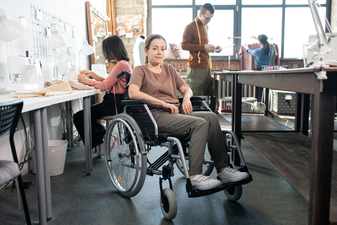 female worker in office in a wheelchair