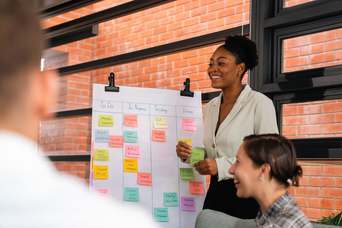 African American woman presenting business plan